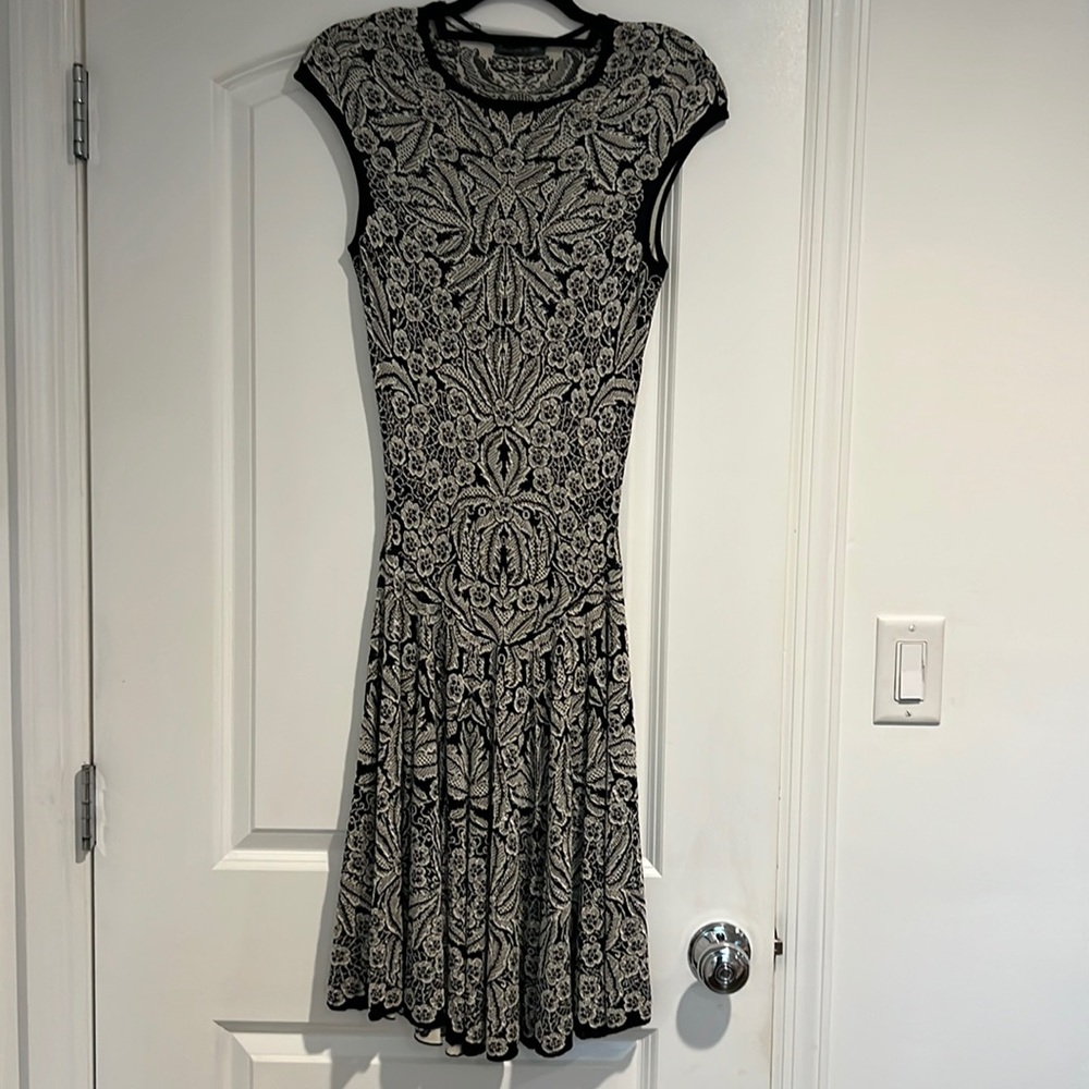 Alexander McQueen dress black lace size 6.  Ripped slightly  easy fix